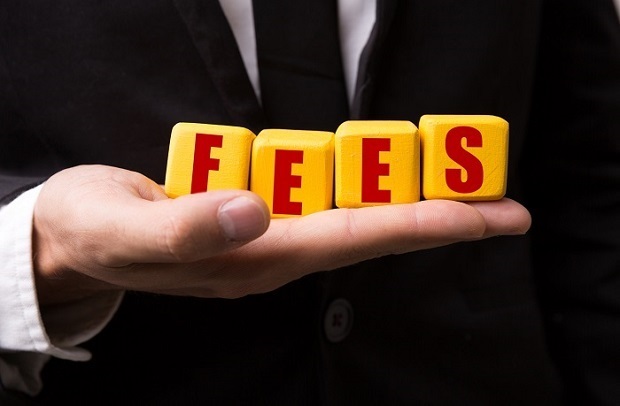 fees spelled out in mans hand