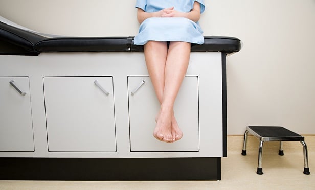 Woman waiting in doctor's office
