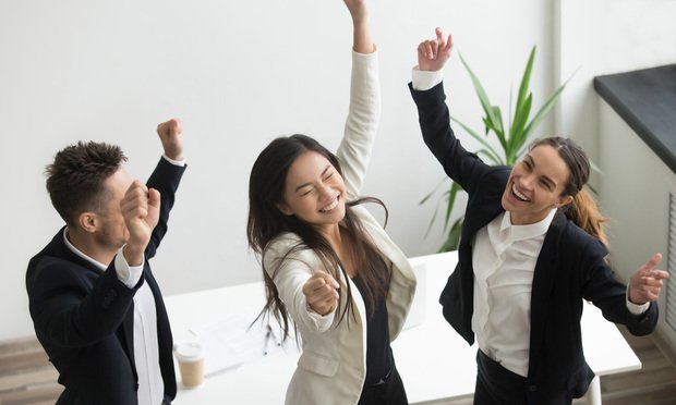 Victory dance concept, excited diverse coworkers celebrating business success, unbelievable achievement triumph, happy euphoric team colleagues jumping dancing in office enjoying great win, top view