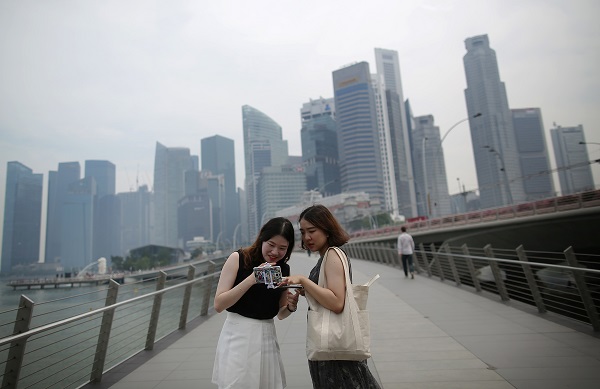 Singapore has a three-pronged retirement system called the Central Provident Fund, to which all Singaporeans and their employers contribute. (Photo: AP)