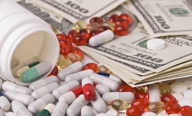 Pill bottle with money