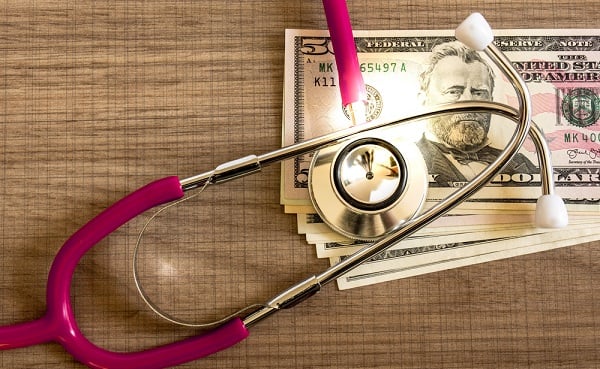 Stethoscope on money