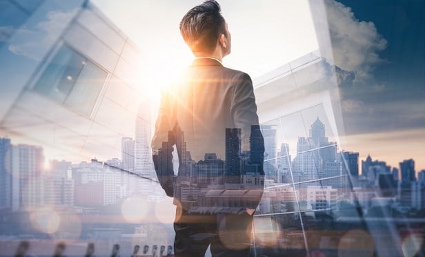 Businessman looking into future