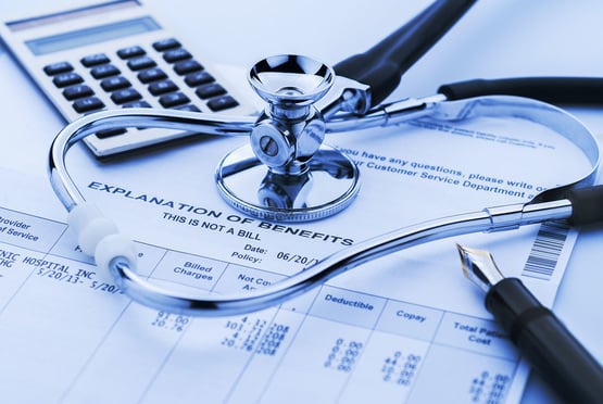 Stethoscope on medical bill