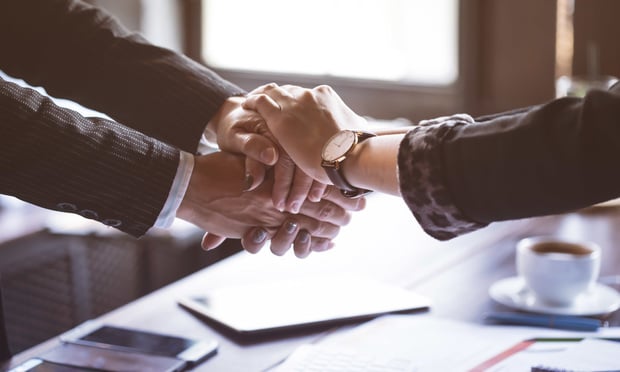 Business trust commitment which Business Partners holding hands with Help, trust ,support ,empathy and factors relationship marketing for reach successful achievement and meeting commit concept..