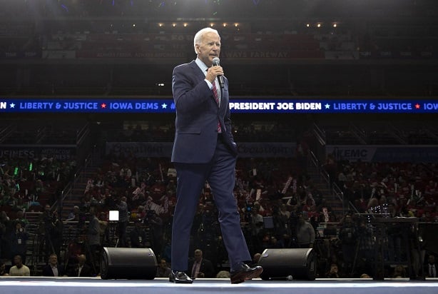 Biden striding across stage