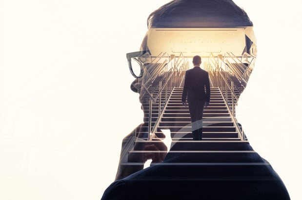 image of business man with superimposed image of man walking