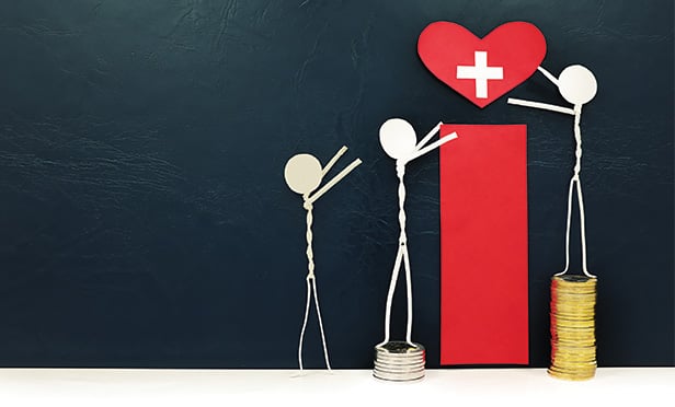 Stick people lifting up a heart