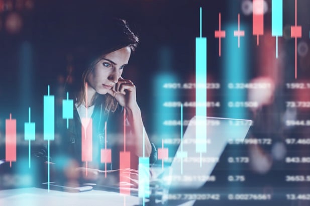 woman looking at stock charts