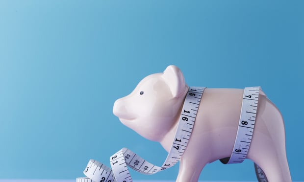 Piggy with measuring tape