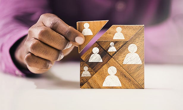 Wooden blocks with people icons