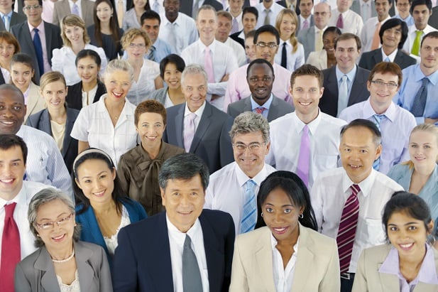 group of people looking up at camera