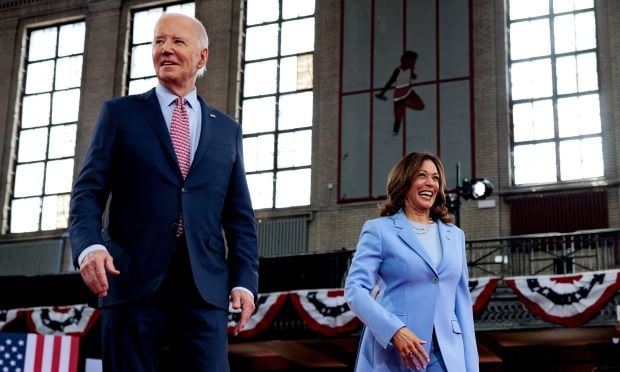 President Joe Biden stands with Vice President Kamala Harris May 29, 2024, at a campaign event in in Philadelphia. Photo: Hannah Beier/Bloomberg