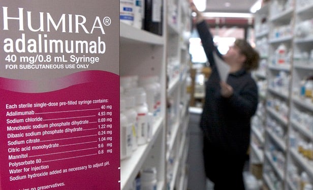 Humira, the injectable rheumatoid arthritis treatment is pictured in a pharmacy in Cambridge, Massachusetts on Wednesday, January 25, 2006. Abbott Laboratories said fourth-quarter sales were lifted by surging demand for its arthritis treatment while Bristol-Myers Squibb Co. said revenue fell as it faces a patent fight on its best-selling product. Photographer: JB Reed/Bloomberg News