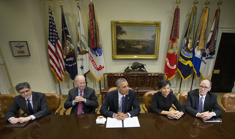 DOL Sec. Perez (far right) with President Obama, VP Biden, and other advisors (Photo: AP)