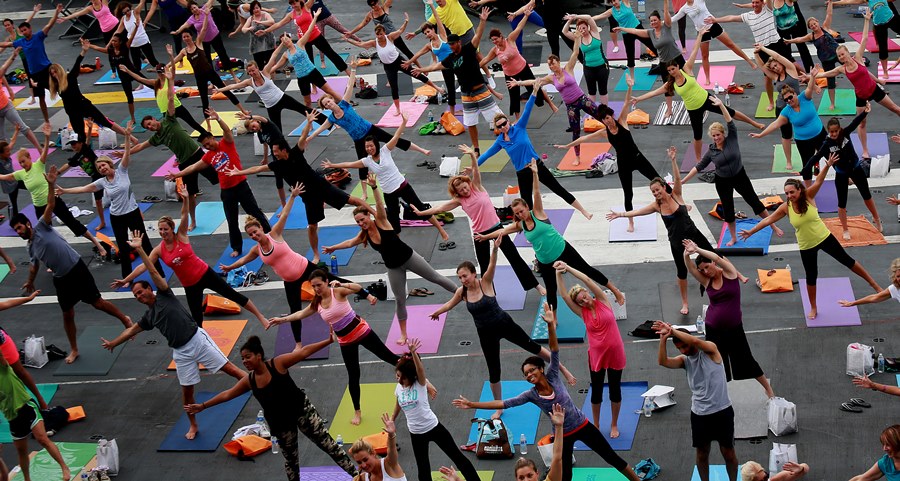 Yoga is a form of exercise that can help your body be strong and graceful as you age. (Photo: AP)