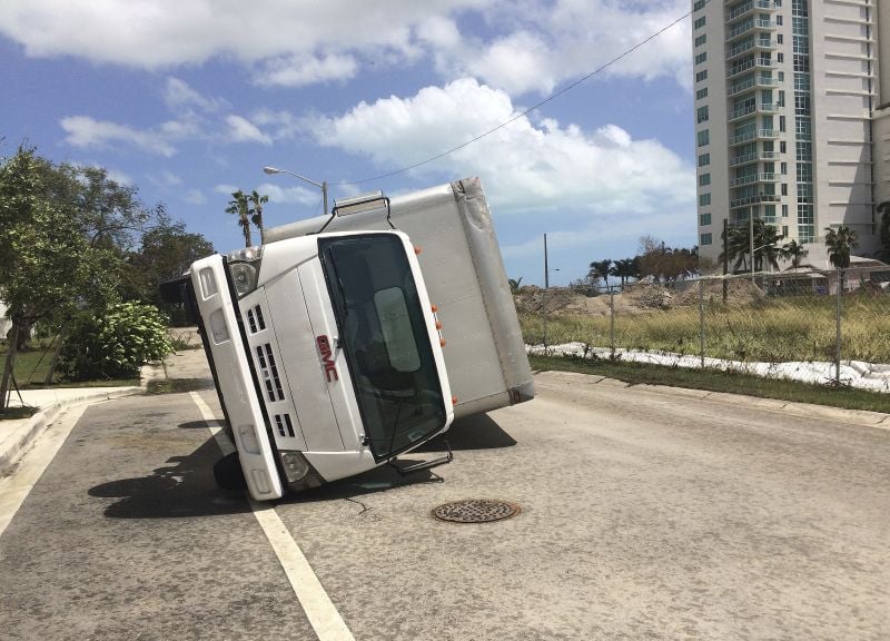 A vehicle lies on it's side in the aftermath of Hurricane Irma