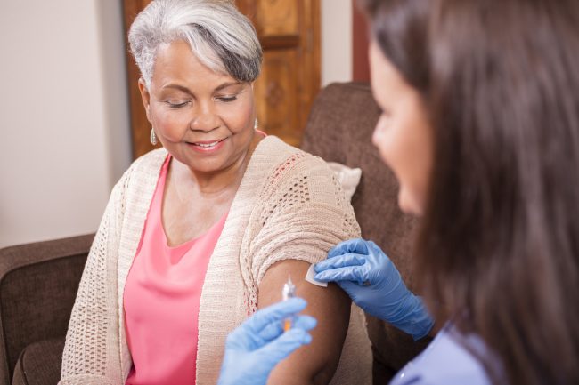 woman getting flu shot