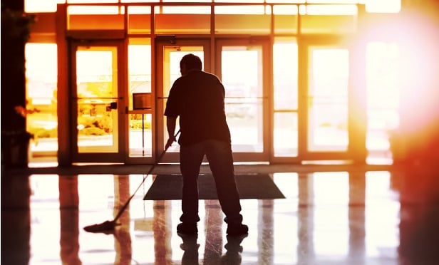 Janitor mopping