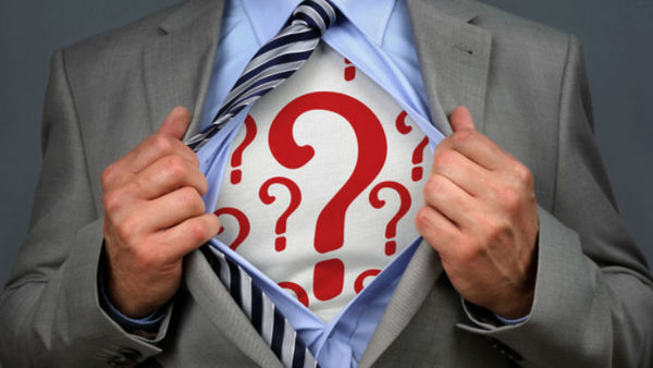 man with question mark on shirt
