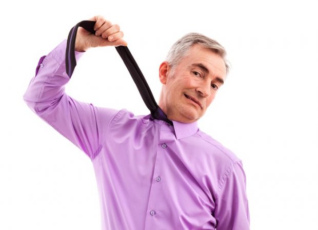 older man with tie pulled up