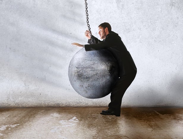wrecking ball hitting man