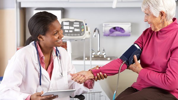 Female doctor with patient