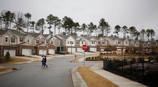 young people walking in new subdivision
