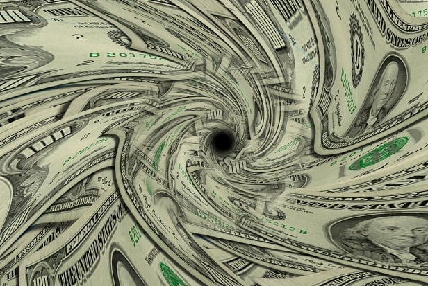 money funneling down drain