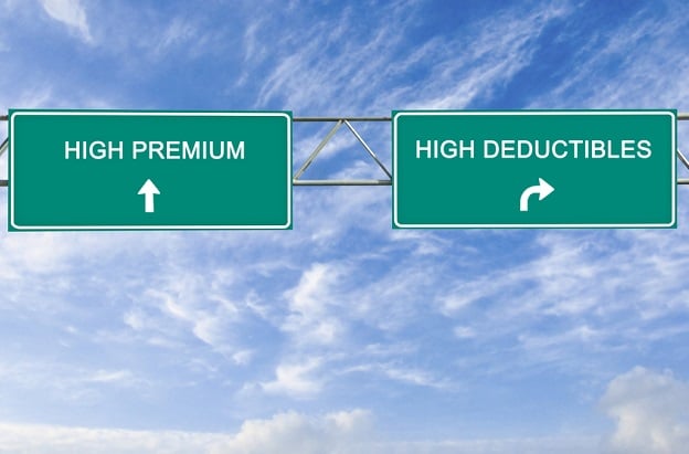 highway sign pointing to high deductible