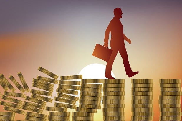 stylized man with briefcase walking across collapsing columns of coins