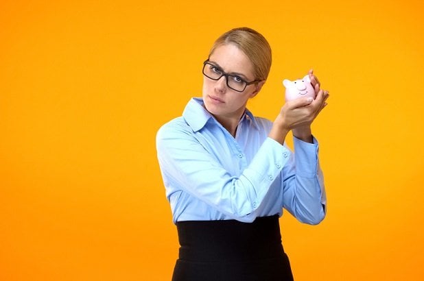 Woman with piggy bank