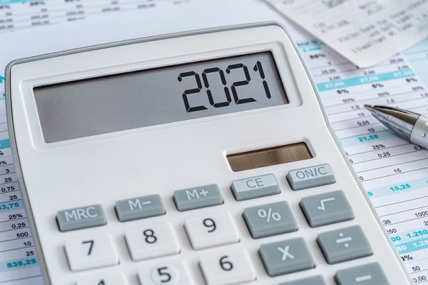 calculator on bills and number window says 2021