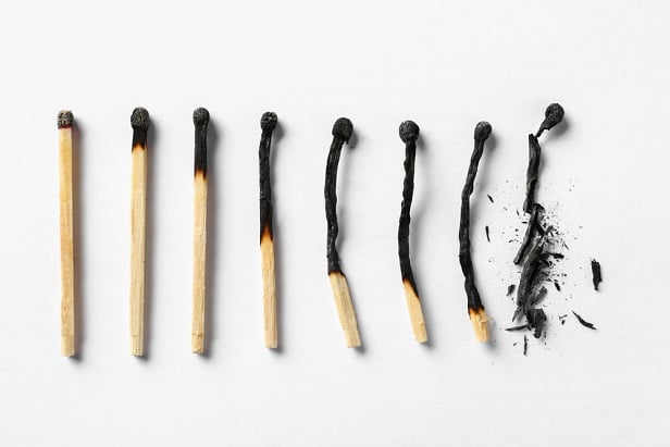 matchsticks at various levels of burned