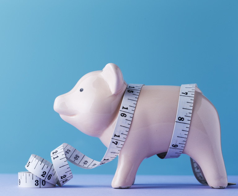 Piggy pank with a tape measure around its waist. Financial Wellness.©mnimage - stock.adobe.com