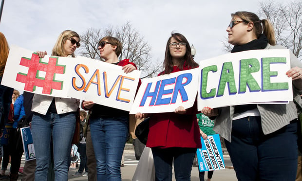 Demonstrators outside Supreme Court , the day of arguments in the case Zubik v. Burwell