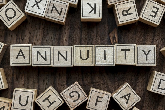 Word Annuity is spelled out with tiles