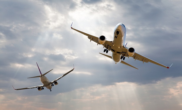 Two planes passing in the air