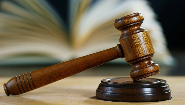 Judge's gavel sitting on desk