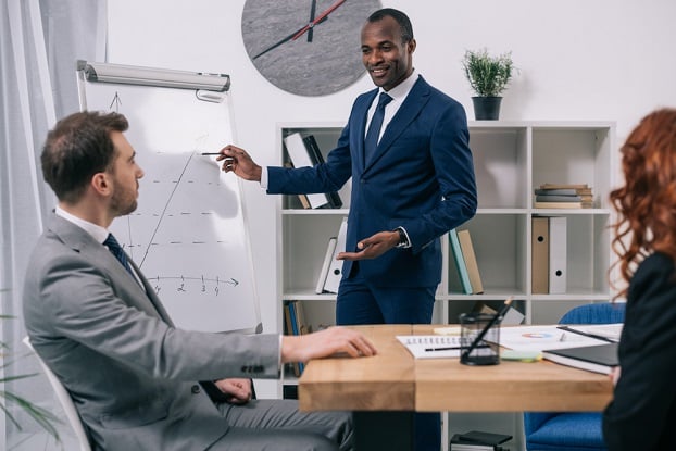 advisor giving presentation to coworkers