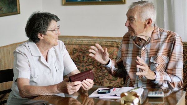 Elderly couple talking