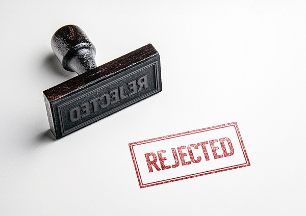 Ink stamp of the word "rejected"