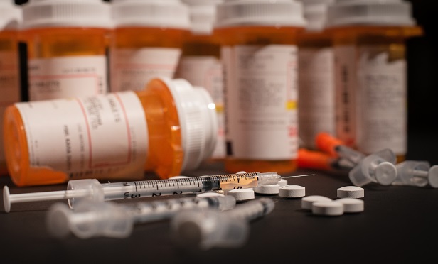 Syringes, pills and prescription bottles