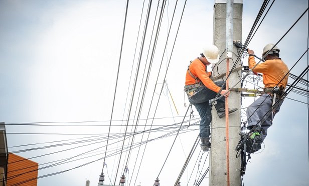 Workers on utility lines