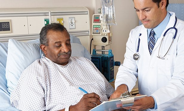 Man in hospital bed