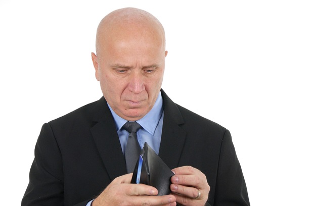 older business man with empty wallet