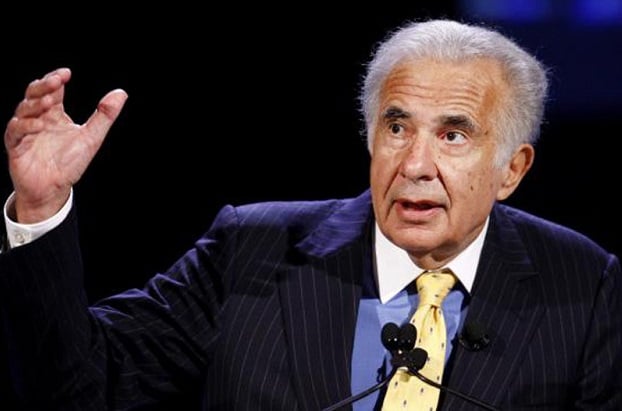Carl Icahn holding up hand