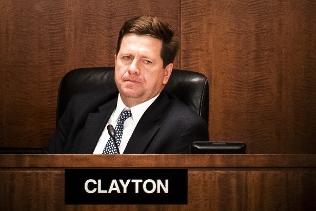 SEC Chair Jay Clayton at a microphone in a hearing June 2019