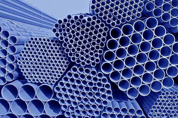abstract image of ends of pipes forming a blue pattern