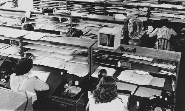Women working in retro office environment